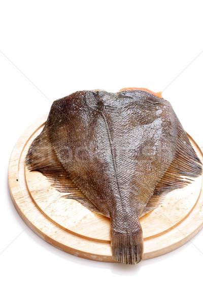 raw flounder on a cutting board on a white background Stock photo © Tatik22