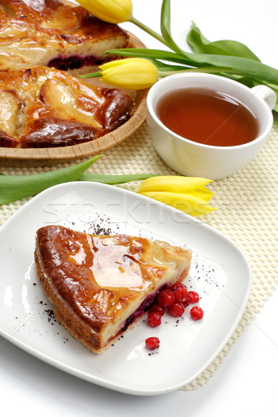 Tea cup, tulips and piece of an apple pie Stock photo © Tatik22