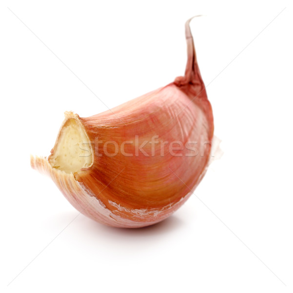 One clove of garlic on a white background Stock photo © Tatik22