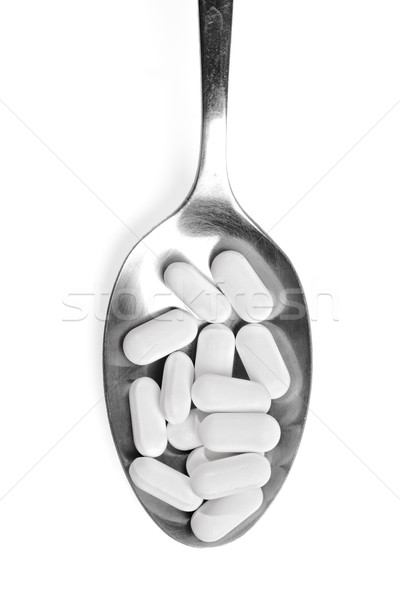 Medycznych łyżka grupy apteki odizolowany tabletka Zdjęcia stock © Tatik22