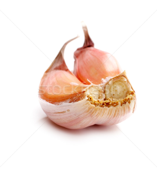 Two cloves of garlic on a white background Stock photo © Tatik22