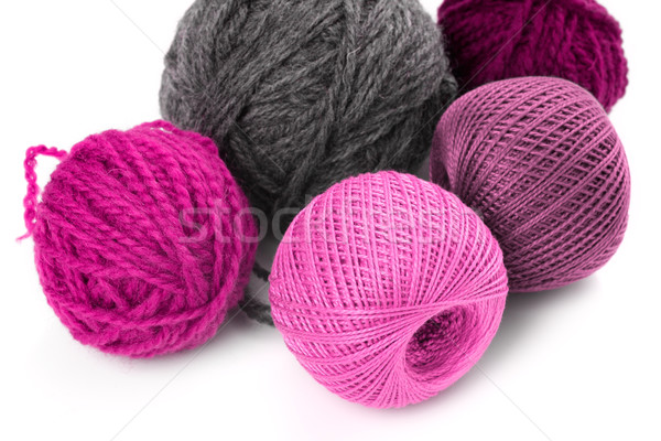few balls of wool on a white background Stock photo © Tatik22