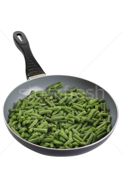 Fried green beans in a frying pan on a white background Stock photo © Tatik22