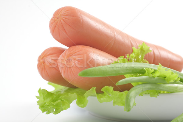 Fraîches saucisses plaque légumes objets blanche [[stock_photo]] © Tatik22