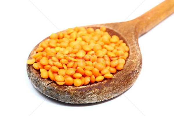 red lentil in wooden spoon Stock photo © taviphoto