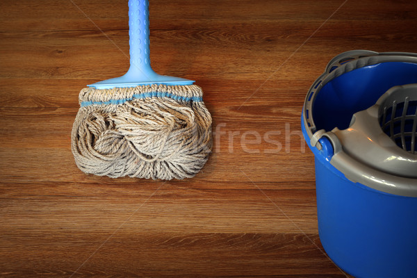 Stock photo: cleaning equipment on wooden floor