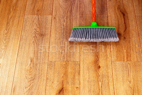 cleaning wooden floor with green plastic broom Stock photo © taviphoto