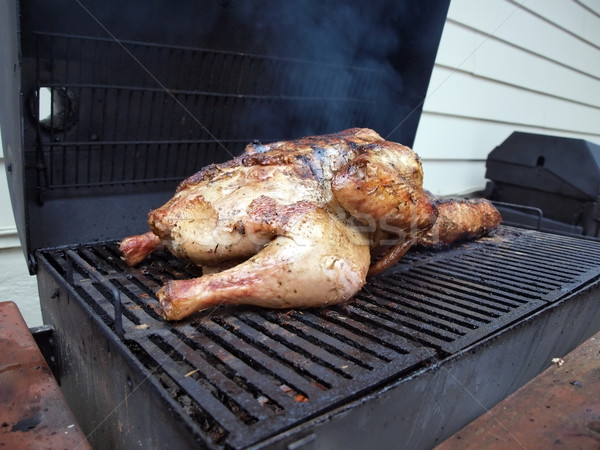 turkey on smoker grill Stock photo © tdoes