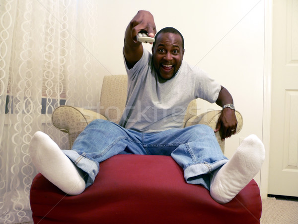 african american man watching tv 6 Stock photo © tdoes