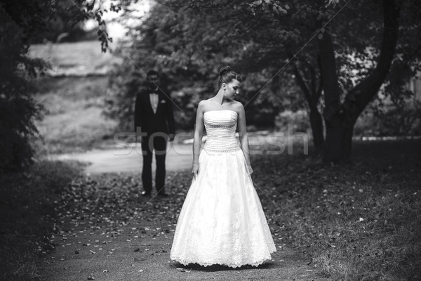 Menyasszony vár vőlegény mögött park nő Stock fotó © tekso