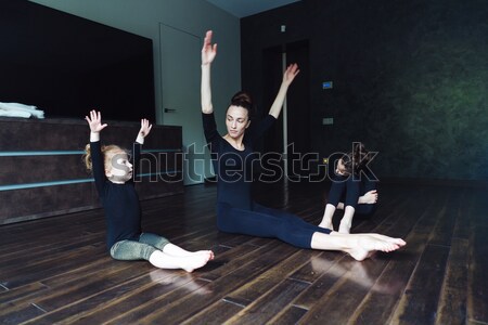 Stock photo: Mom and two daughters spend time together