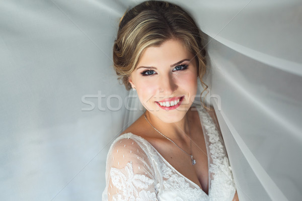 Bride posing in a hotel room Stock photo © tekso