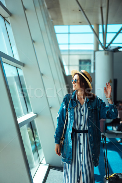 Woman go travel with suit case at airport Stock photo © tekso