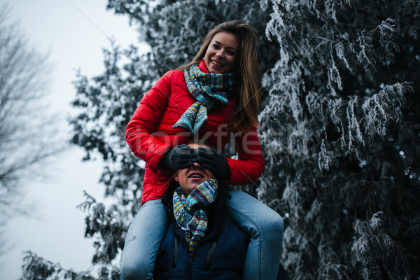 man carries his girlfriend on back Stock photo © tekso