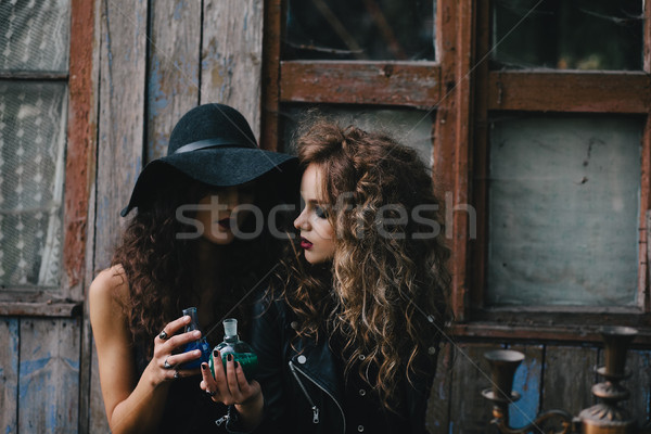 Two vintage witches perform magic ritual Stock photo © tekso