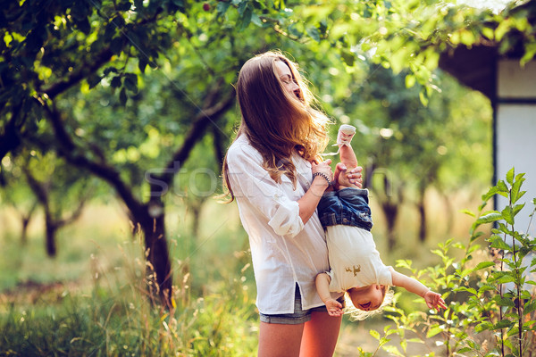 mom and little girl having fun Stock photo © tekso