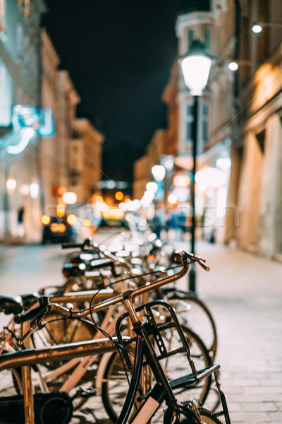 Stock fotó: Biciklik · bérlés · parkolás · kerület · este · utca