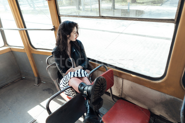 Nő utazó bent villamos élvezi napos Stock fotó © tekso