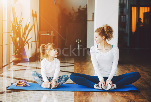 Two girls of different ages makeing yoga Stock photo © tekso