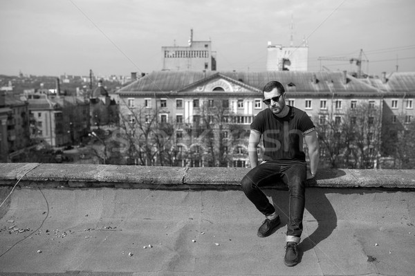 Confident man posing in selvedge  jeans Stock photo © tekso