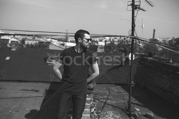 Confident man posing in selvedge  jeans Stock photo © tekso