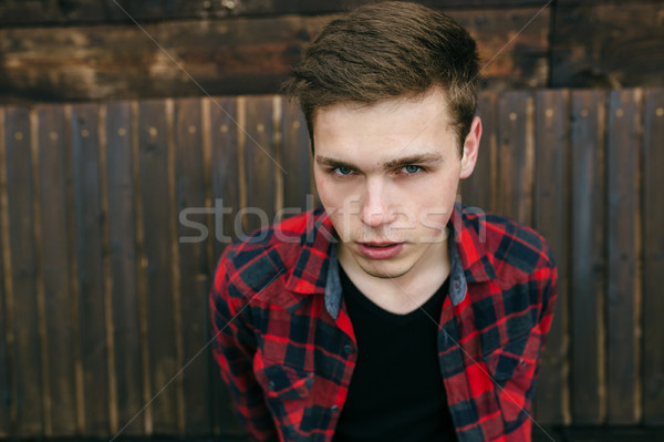 bearded man in a plaid shirt Stock photo © tekso