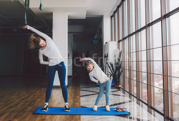 Two girls of different ages makeing yoga Stock photo © tekso