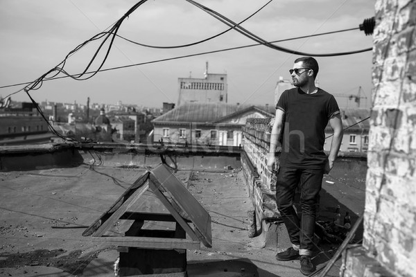 Confident man posing in selvedge  jeans Stock photo © tekso