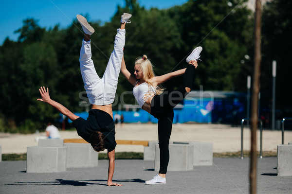 man and woman performing tricks Stock photo © tekso