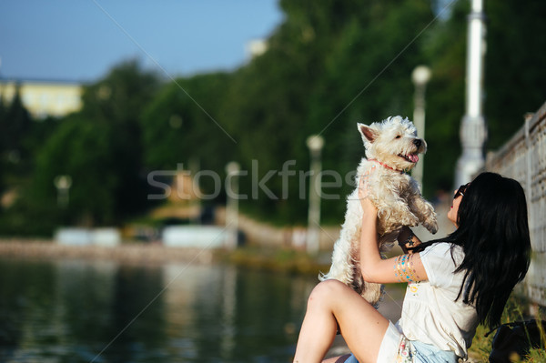 girl with a dog on the lake Stock photo © tekso