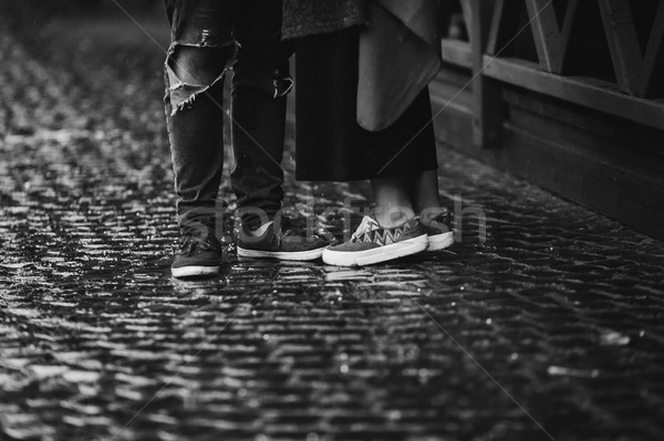 Guy fille parapluie posant ensemble pluie [[stock_photo]] © tekso