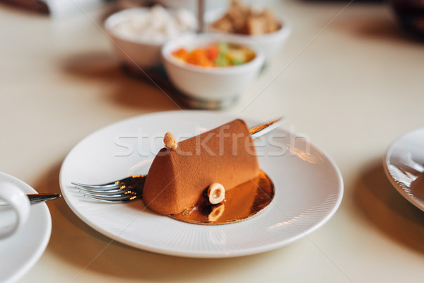 Chocolate cake on a plate Stock photo © tekso