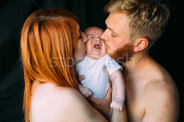 happy family on a black background Stock photo © tekso