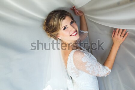 Bride posing in a hotel room Stock photo © tekso