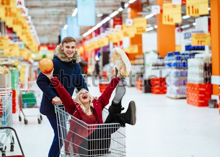 Portrait of happy young couple having fun. Stock photo © tekso