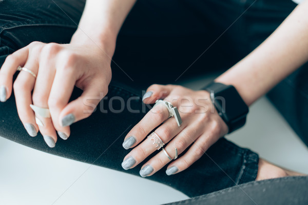 Stock photo: Slender girl with a smart clock on her arm