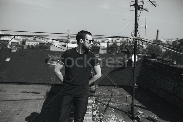 Confident man posing in selvedge  jeans Stock photo © tekso