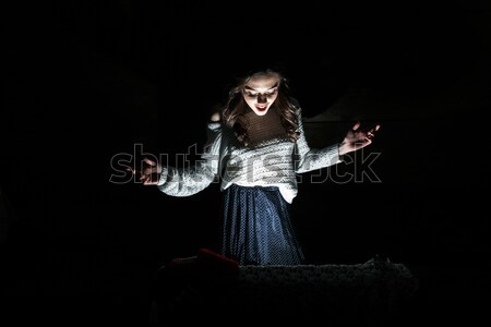 Lovely girl opens a box Stock photo © tekso