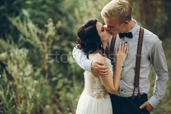 bride and groom kissing Stock photo © tekso