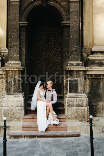 Bride sitting on lap of the bride Stock photo © tekso