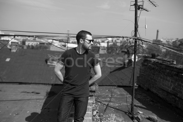 Confident man posing in selvedge  jeans Stock photo © tekso