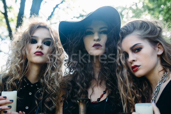 Stock photo: three vintage women as witches