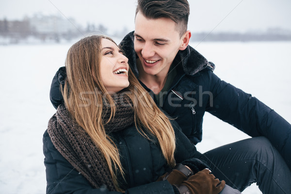 couple sitting on the snow Stock photo © tekso
