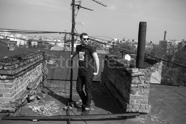 Confident man posing in selvedge  jeans Stock photo © tekso