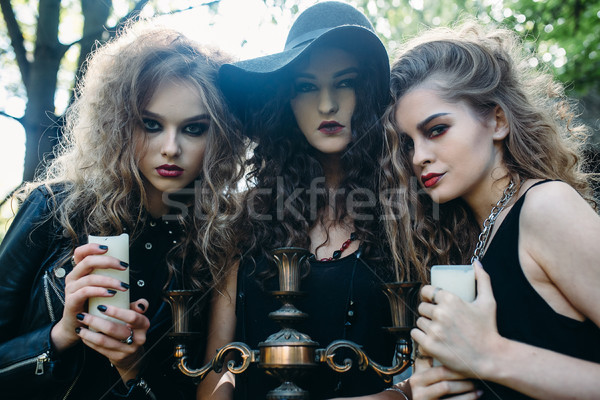 Stock photo: three vintage women as witches