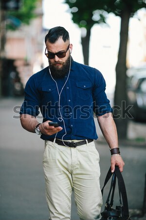 Confident man posing in selvedge  jeans Stock photo © tekso