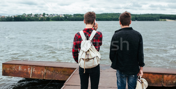 two young guys stand on the pier Stock photo © tekso