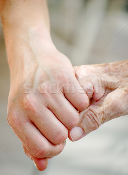 Vieux jeunes main jeune homme grand-mère famille [[stock_photo]] © tepic