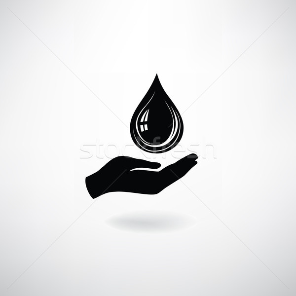 Drop icon in hand silhouette on a white background. Save water sign Stock photo © Terriana