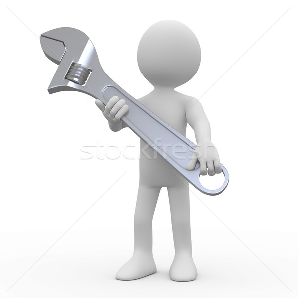 Man with a huge adjustable spanner Stock photo © texelart